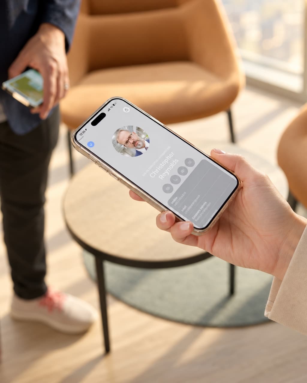 Two phones exchanging HeyDrop cards