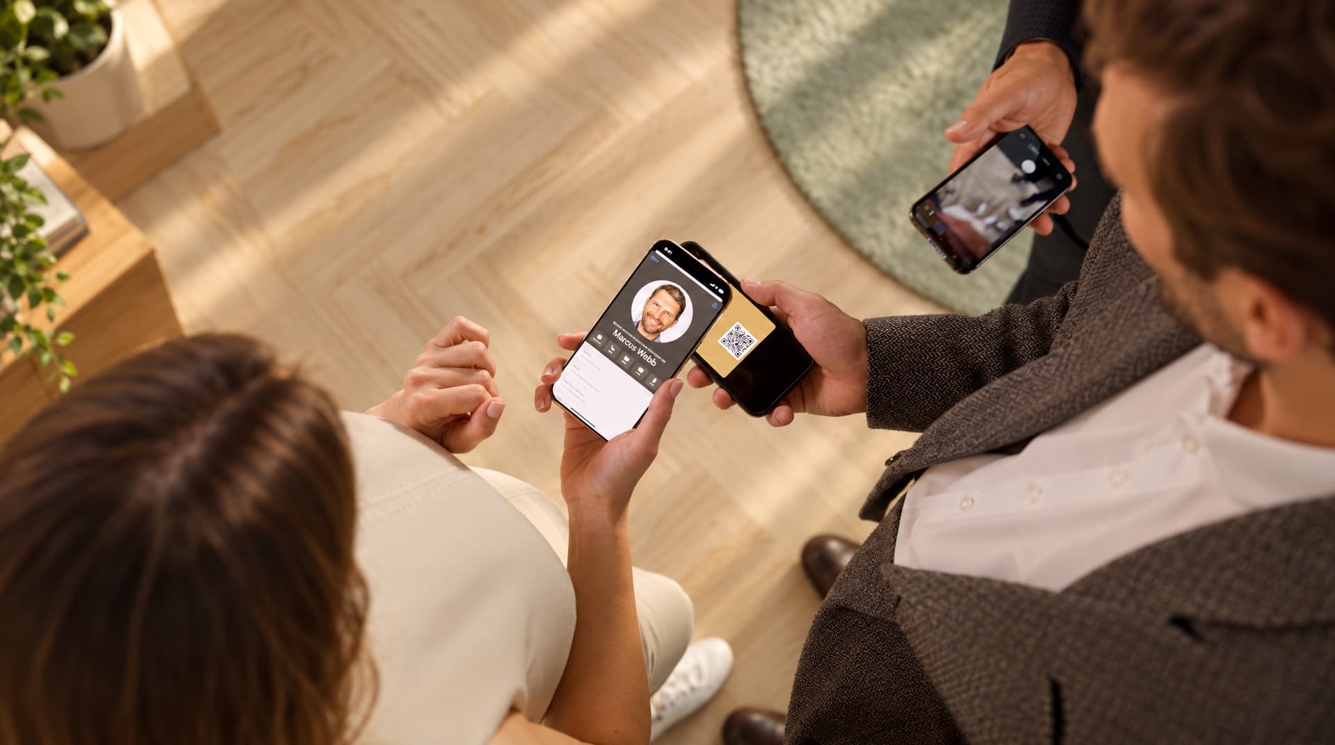 Scanning a HeyDrop QR code opens the card on the other phone