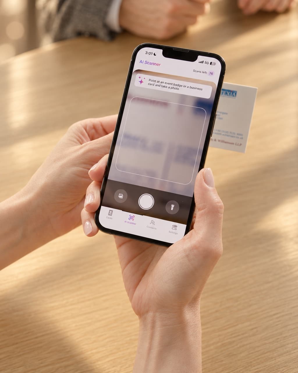 Scanning a paper business card with the HeyDrop AI Scanner
